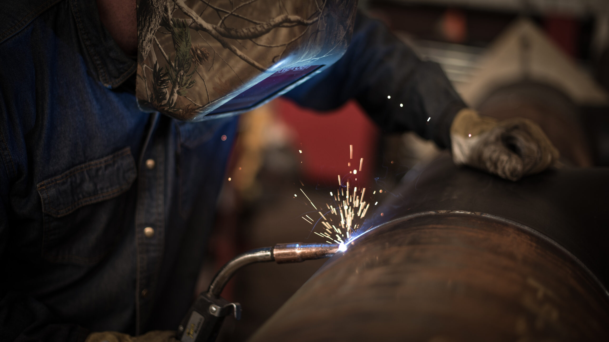 A Blackeagle Construction welder on a job site in Colorado