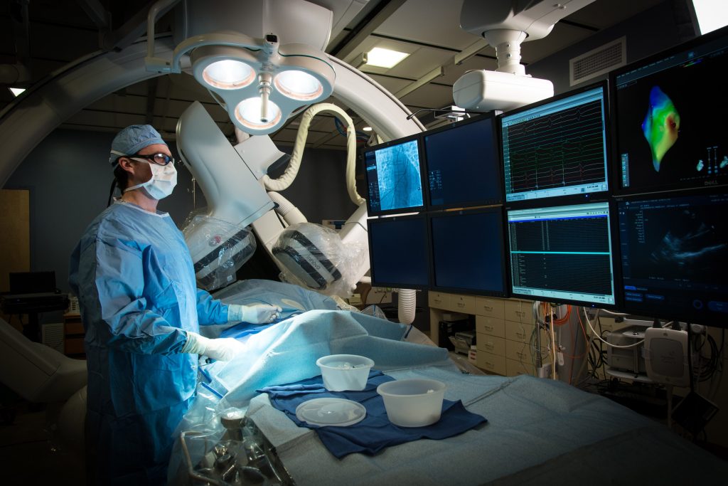 surgeon looking at xray - corporate photographer