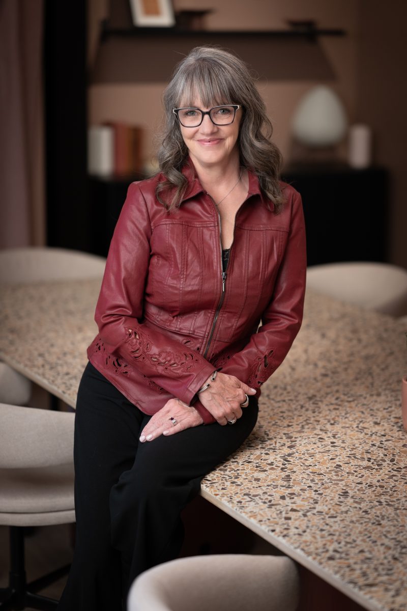 female entrepreneur working at laptop