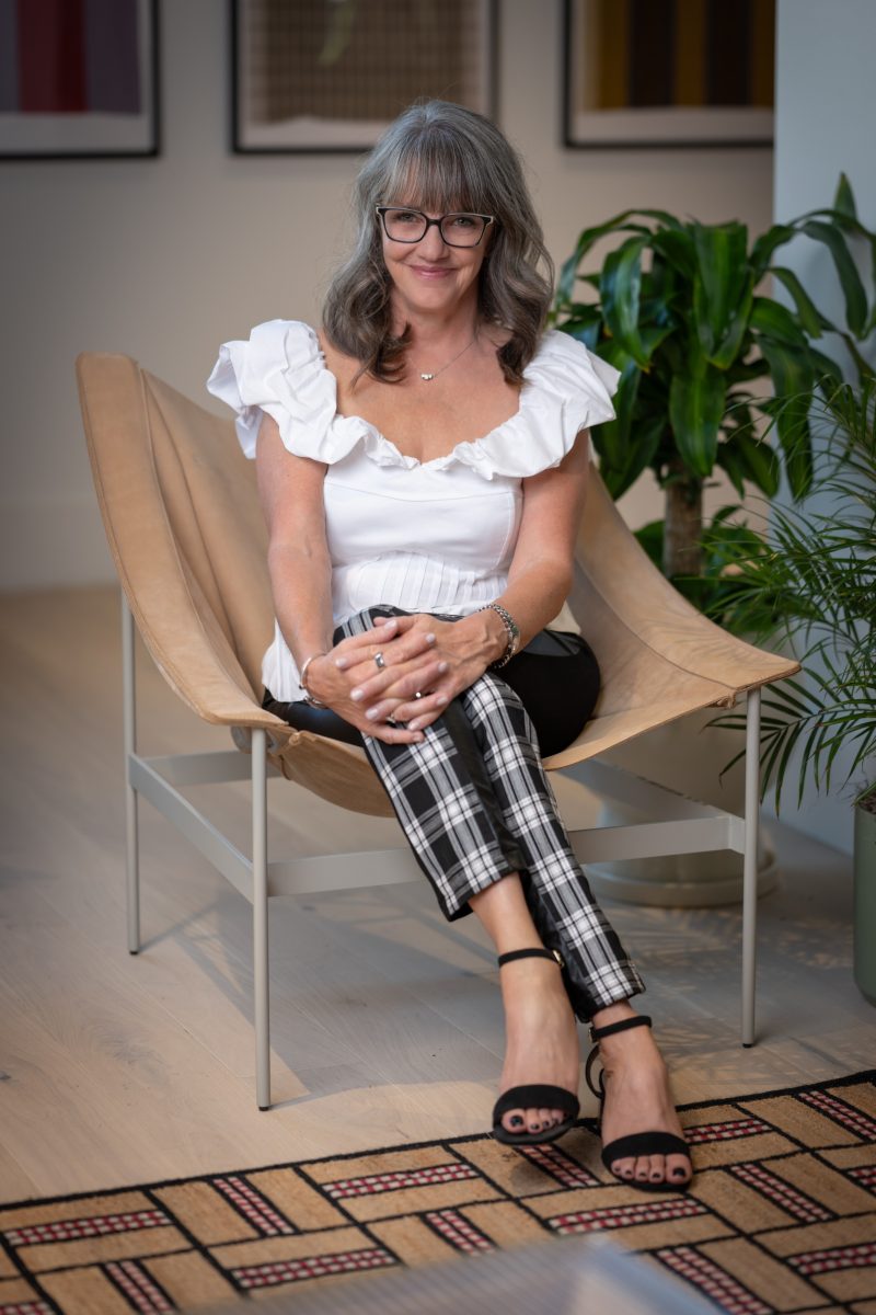 female entrepreneur working at laptop