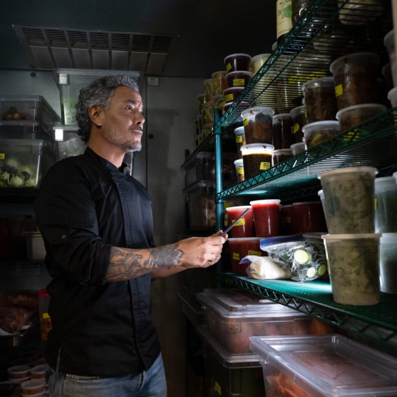 female entrepreneur working at laptop