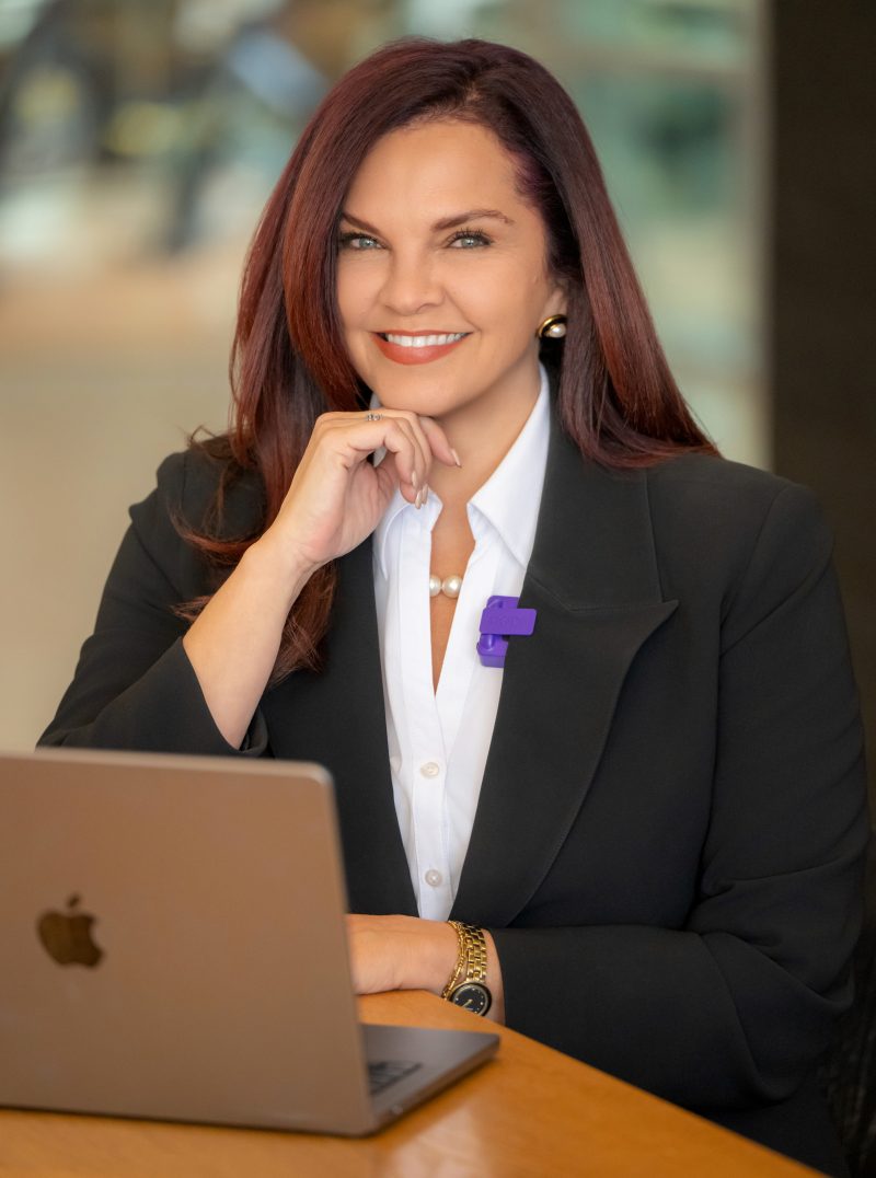 female entrepreneur working at laptop
